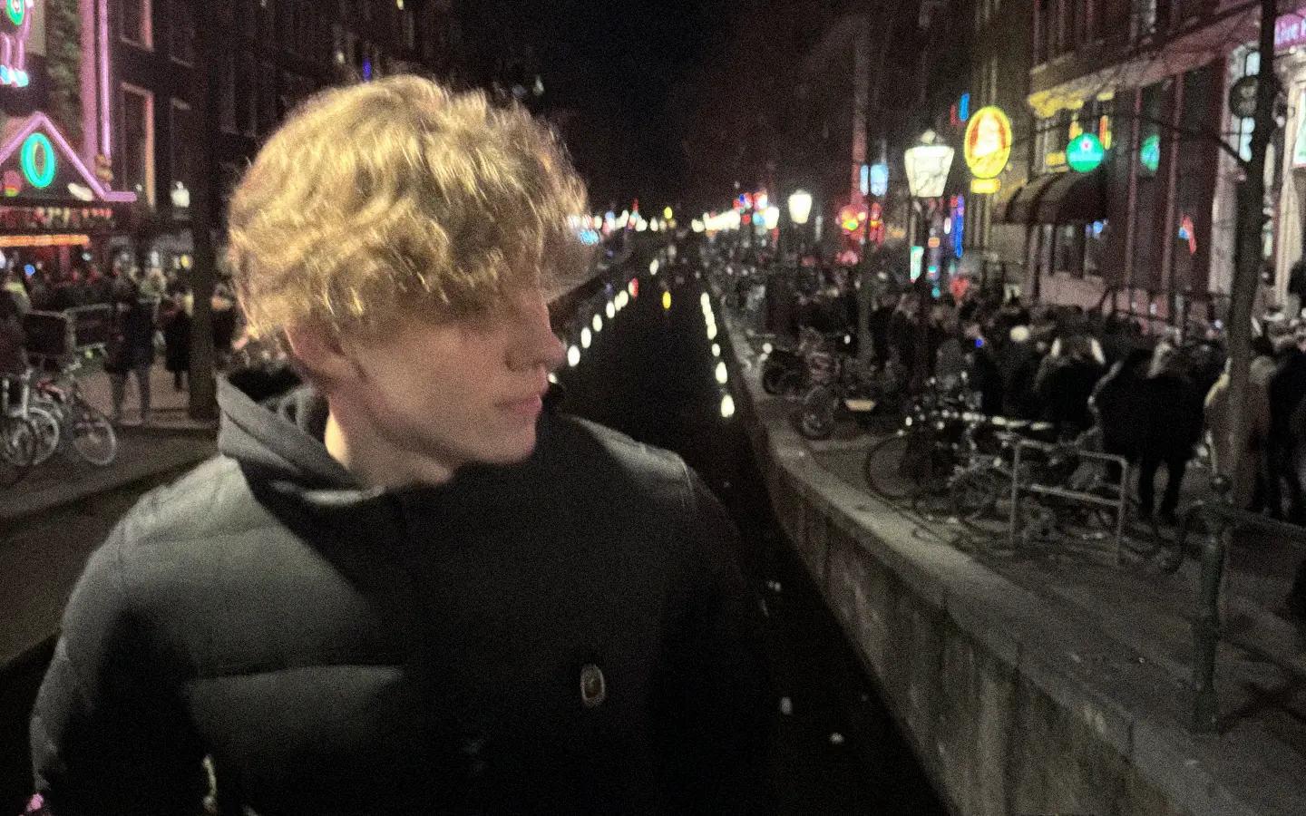 Portrait of Yaroslav Kostyk on a canal street at night